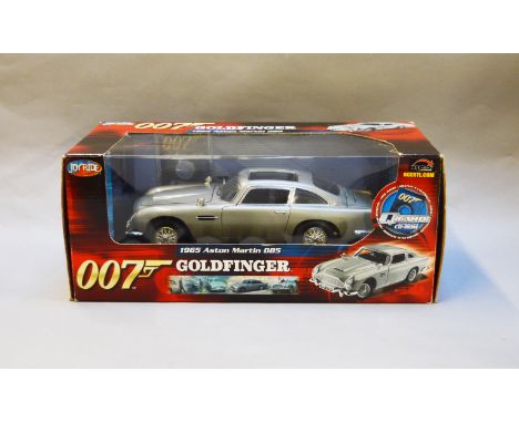 James Bond 007. A boxed Joyride 1:18 scale Aston Martin DB5, issued in 2004, modelled on the vehicle in the film 'Goldfinger'