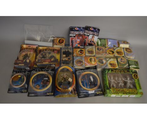 A mixed lot of figures which includes; Planet Of The Apes, Terminator 2, Lord Of The Rings, Babylon 5 etc along with some mug