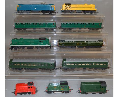 OO Gauge. 9 unboxed Tri-ang Locomotives, including green and yellow variants of the&nbsp; R155 Diesel Switcher, R.753 Electri