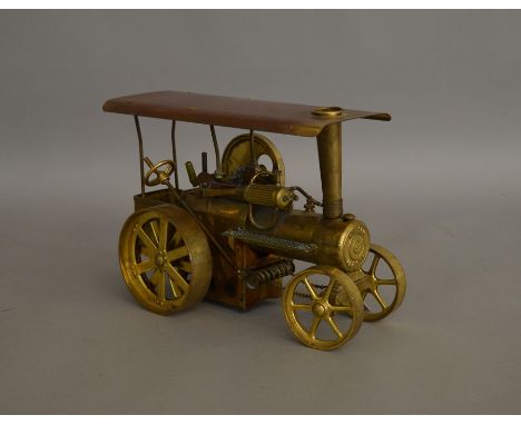 Live Steam. An unboxed brass Wilesco Traktor, traction engine model, which has been fired,&nbsp; with burner tray and chain l