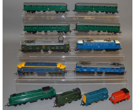 OO Gauge. 9 unboxed Tri-ang Locomotives, including green and yellow variants of the  R155 Diesel Switcher in green, R.159 Dou
