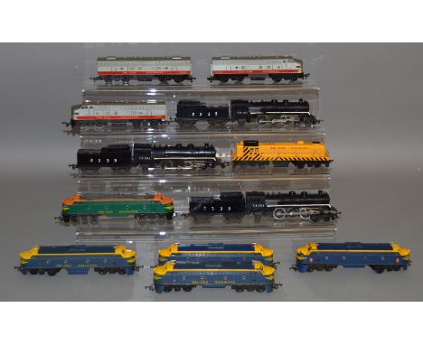 OO Gauge. A good selection of unboxed Tri-ang Continental Locomotives including an R.155 Diesel Switcher with working headlig