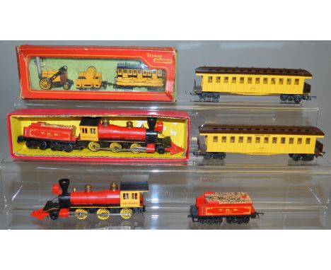 OO Gauge. A boxed Tri-ang R.346 Stepheson's Rocket Train including locomotive, tender and a coach, overall G in P packaging w