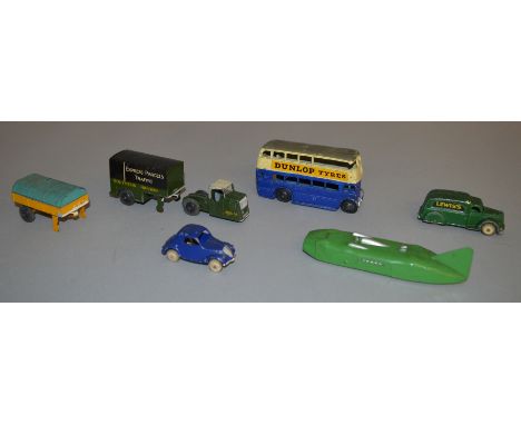 3 unboxed Pre-War Dinky Toys including 33rd Mechanical Horse and Trailer 'Southern Railways Express Parcels Traffic', 29c Bus