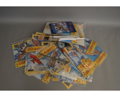 Build the Red Baron's Fighter Plane by Hachette 1:8 scale model which includes 1-100 with some duplicates, most bags are stil