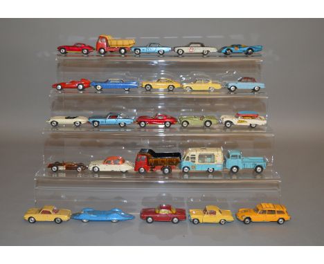 25 unboxed Corgi Toys with varying degrees of play wear and with some repainting, including 428 Smiths Karrier Ice Cream Van 