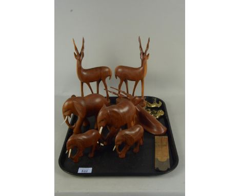 Assorted carved hardwood animal figures, a vintage rule plus four brass miniature horses