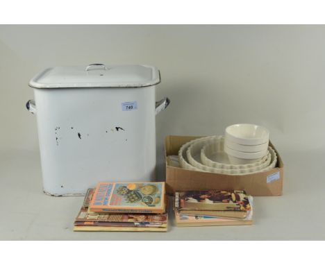 A vintage enamel bread bin, cookery booklets, pudding basins etc