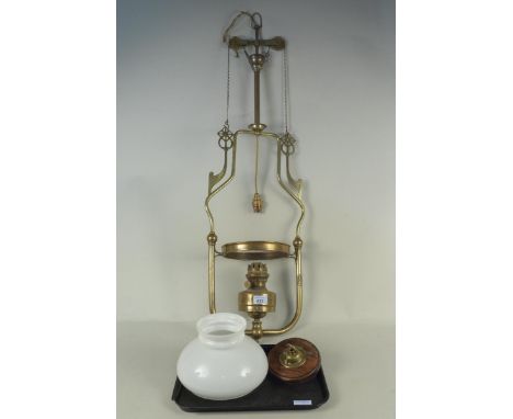 An Edwardian brass handing oil lamp, now converted to electricity, bears makers label for 'Joseph Rute', 98cm high