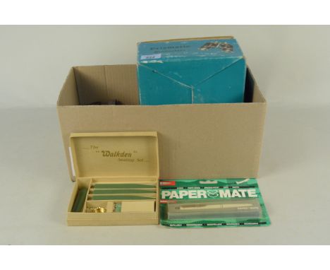 A mixed lot including a pair of Prismatic binoculars, cased antique binoculars, vintage Parker pens in packaging, a wax seali
