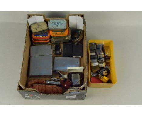 An interesting mixed box of vintage petrol lighters, a Japanese pocket torch, a Silva Helios storm proof lighter for the Volv
