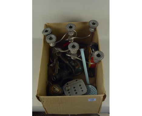A small box of mixed kitchenalia including an enamel strainer spoon and mincers plus a pair of three branch candelabra
