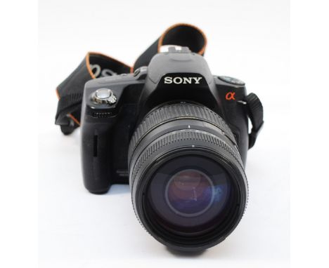 A Sony a390 digital camera, with Tamron f/4-5.6 70-300mm lens.
