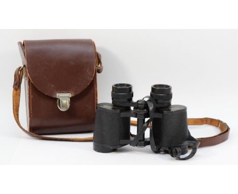 A pair of Carl Zeiss Jena Jenoptem binoculars, 8 x 30, with leather case.