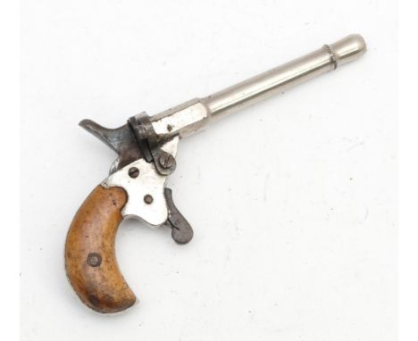 A late 19th century, ladies blank-firing muff 'bicycle' pistol, nickel plated with wooden grips, mechanism in full working or