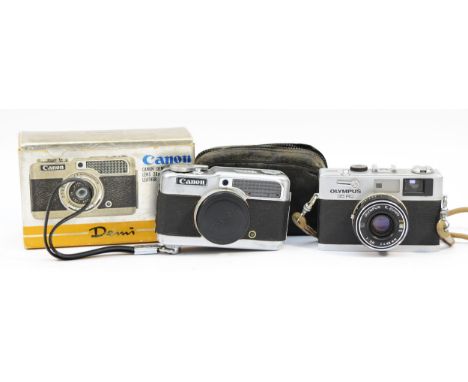 A Canon Demi 35mm film camera, body no. 194270, boxed, and a Olympus 35 RC film camera. (2)