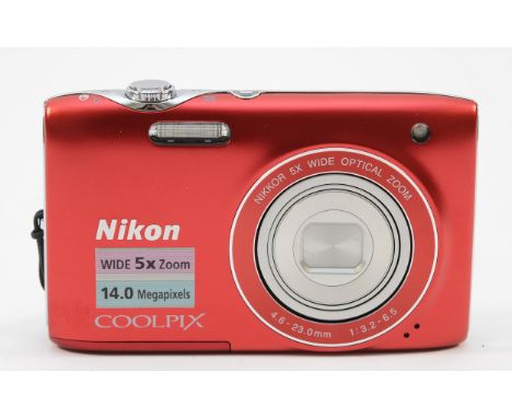 A Nikon Coolpix S3100 digital camera, in red.