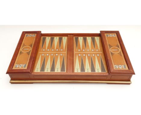 Franklin Mint; The Excalibur backgammon set, comes with gold plated and silver plated counters, dice & shaker, 66x36cm. One o