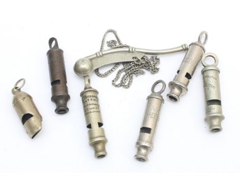A collection of seven whistles, to include the Metropolitan Police 13 Barr Street, A.R.P and Bosun, marked with the broad arr