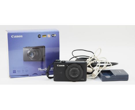 A Canon Powershot S110 digital camera, boxed.
