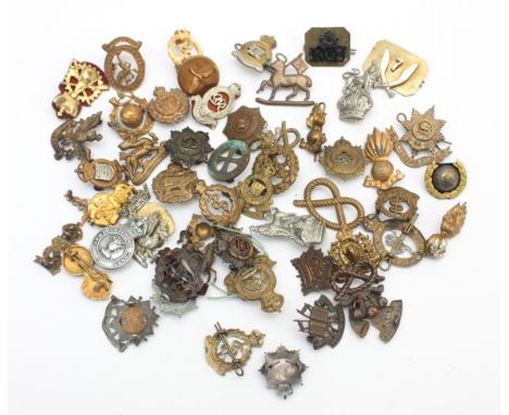 A collection of mixed military collar badges, to include the Tank Corps, Canada and Army Education Corps.