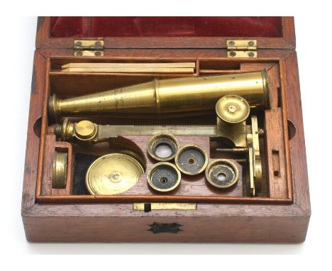 A mid-late nineteenth century brass compound microscope, with two slides and four lenses, in fitted mahogany case, H-4.5cm x 
