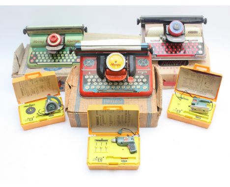 Mettype/Mettoy three tinplate toy typewriters, boxed, together with three Ideal Toys; miniature battery operated power tools,