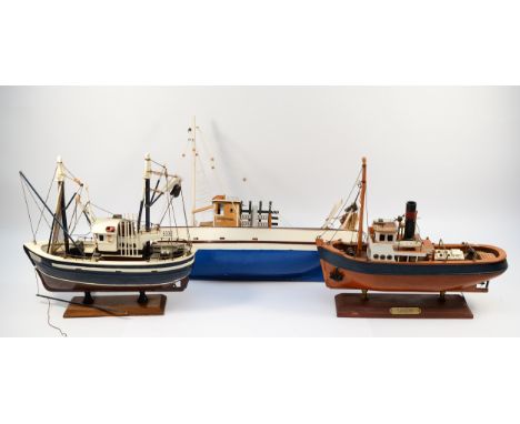 A wooden model of the 1930s deep tug boat 'Sanson', on stand with name plaque, H-29cm x 33, a model of a fishing trawler on s