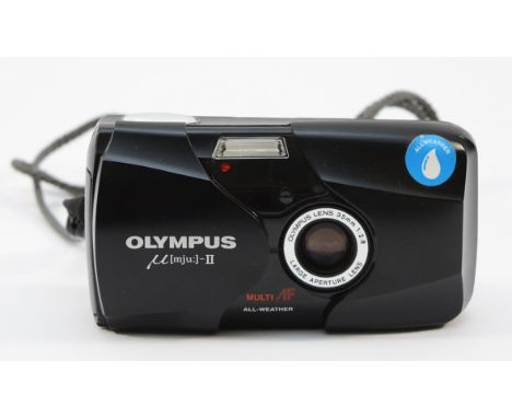 An Olympus MJU II compact 35mm camera. 