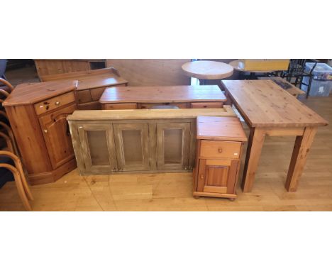 A group of six pine furniture pieces, to include a refectory style dining table, having rectangular top on square stile legs,