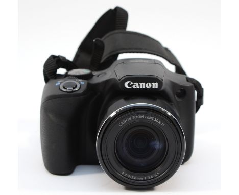 A Canon Powershot SX540 HS digital camera. 