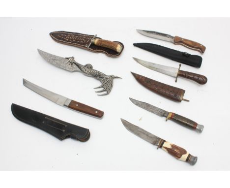 A collection of seven 20th century and later reproduction daggers to include a Will Rodgers hunting knife, Tramontina and oth