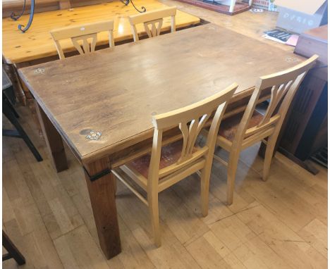 A modern rustic pine dining table, of rectangular form, 149x88cm together with a set of four dining chairs, slatted backs wit