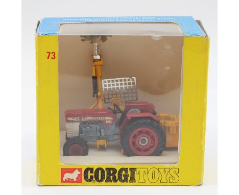 Corgi Toys; A boxed Corgi Massey-Furguson '165' Tractor with saw attachment '73' 