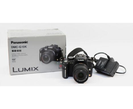 A Pansonic Lumix DMC-G10K with a Lumix f/3.5-5.6 lens, boxed.