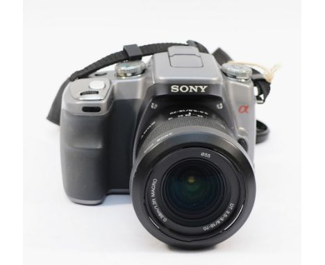 A Sony A100 digital camera, with Sony f/3.5-5.6 18-70mm lens.