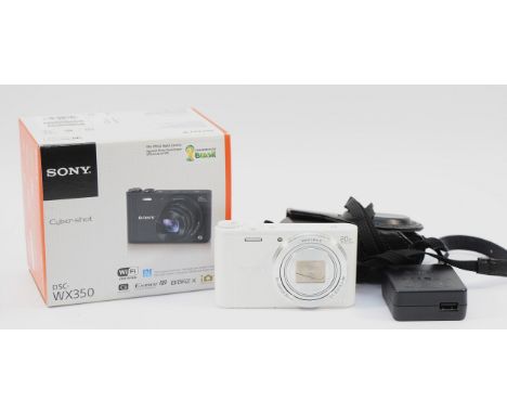 A Sony Cybershot DSC-WX350 digital camera, boxed with travel case.