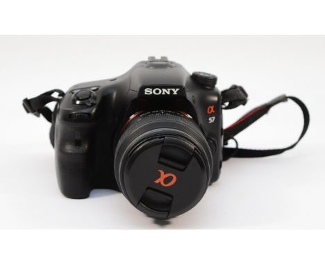 A Sony A57 digital camera, with a Sony f/3.5-5.6 18-55mm lens.