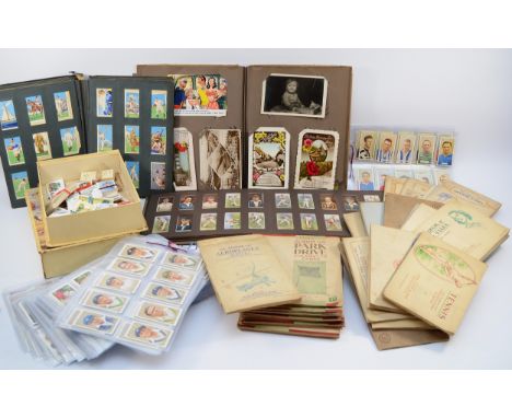 A collection of cigarette cards, loose and in albums, to include, Park Drive, Ogden's, John Player and Sons, and Gallaher, se