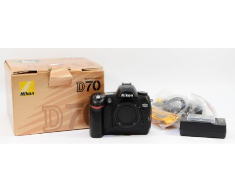 A Nikon D70 camera body, in original box.