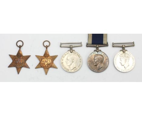 WWII Naval Long Service medal group, to include the 1939-1945 Star, Atlantic, War, Defence and the George VI Naval Long Servi