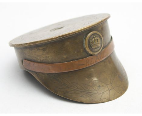 WWI period trench art, converted into a cap, featuring a German Army military button and phrase 'Peace'.