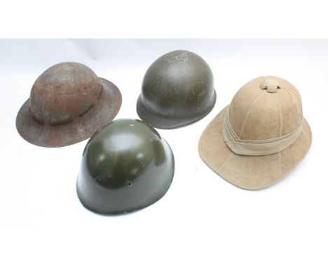 WWII Era British pith helmet by Failsworth, together with the British steel helmet by Ruben Owen and co, patented 9/41 and to