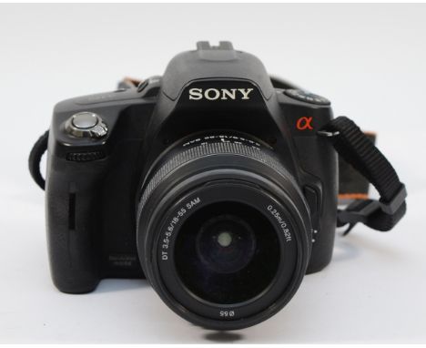 A Sony A390 DSLR camera with a Sony f/3.5-5.6 18-55mm lens. 