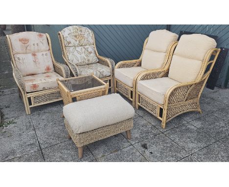 A rattan and bamboo conservatory suite, comprising four armchairs, a coffee table and a stool, chair size W66, H93, D77cm. (6