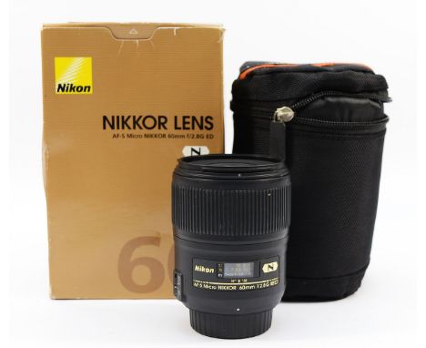 A Nikon Nikkor AF-S f/2.8 60mm lens, boxed. Condition:This lens has been tested with a camera body and it focuses well on man