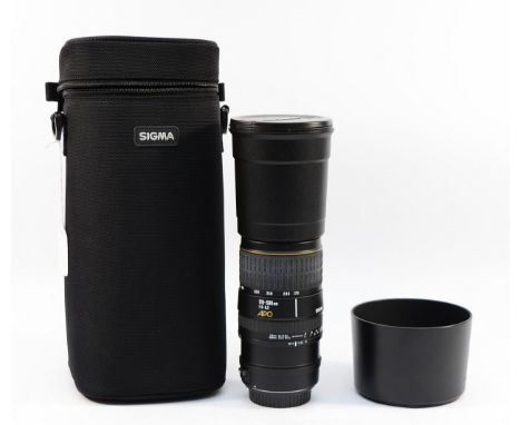 A Sigma APO f/5-6.3 170-500mm lens, in soft travel case.