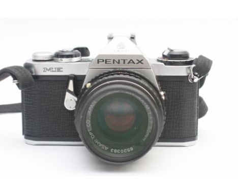 An Asahi Pentax ME film camera with a Pentax-M f/1.7 50mm lens. 