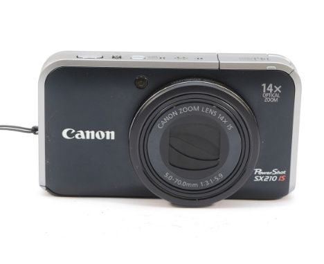 A Canon Powershot SX210 IS digital camera, boxed.