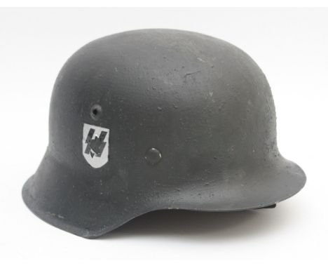 WWII German steel M42 helmet, later on added doubled sided decal, complete with its original leather interior, patented ET-68